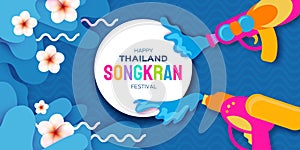 Songkran Festival with Blue water splash. Thailand New Year. Thai happy asian holidays. Water festival party.