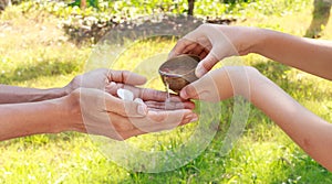 Songkran festival - pour water on the hands of revered elders photo