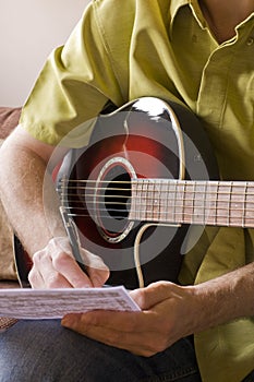 Songwriting on acoustic guitar