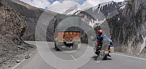 Sonmarg, Jammu and Kashmir - June 18 2019: A biker crossing th zojila pass at height of 11,000 feets