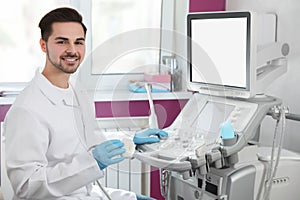 Sonographer using modern ultrasound machine