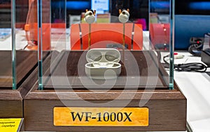 SONY wireless WF-1000x headphone are shown on demo stand in electronics store. Minsk, Belarus, 2022