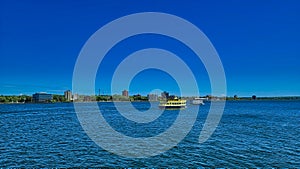 Soo locks famous and original boat tours race each other out of the soo locks near Sault Ste Marie Ontario Canada