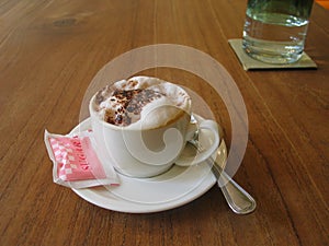 A soothing cappuccino - another delight for your audience ! photo