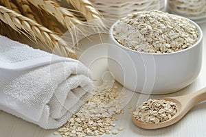 a soothing oatmeal bath preparation with colloidal oatmeal and a towel