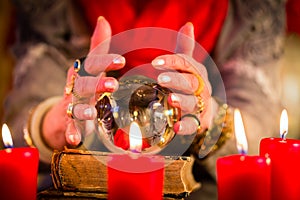 Soothsayer during esoteric session with Crystal ball