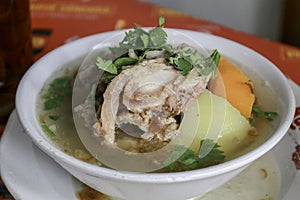 Sop buntut or oxtail soup. Indonesian traditional culinary photo