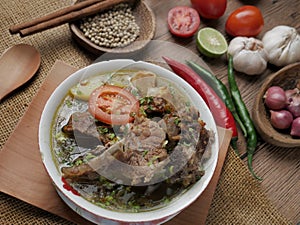 Sop Buntut or Sop Tulang Sapi, Indonesian Oxtail Soup photo