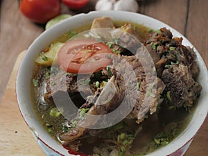 Sop Buntut or Sop Tulang Sapi, Indonesian Oxtail Soup photo