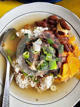 Sop Senerek, a savory soup from Magelang, Central Java, features a rich broth with slices of meat, carrots, red beans