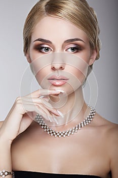 Sophisticated Aristocratic Posh Lady with Pearly Necklace photo