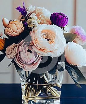 Sophisticated floral arrangement using a mix of different blooms.