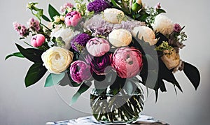 Sophisticated floral arrangement using a mix of different blooms. Panorama