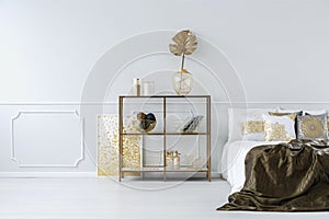 Sophisticated gold bedroom interior