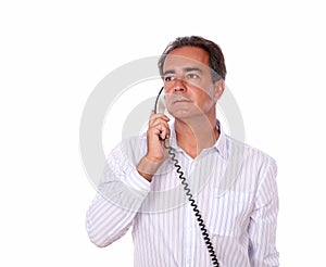 Sophisticated senior male talking on phone