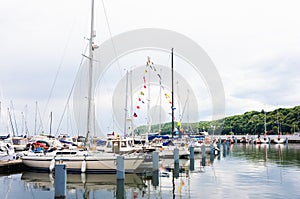 Sopot/Poland - 2020: Yacht parking in harbor, harbor yacht club.  Boats moored in bay in rainy weather.