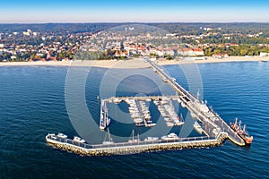 Sopot resort in Poland with pier, marina yachts, ship and beach