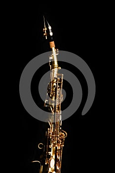 Soprano saxophone on black background
