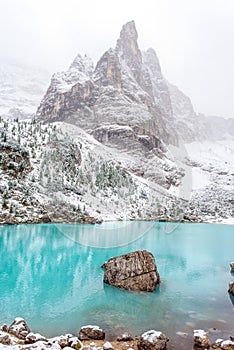 Sorapis lake in dolomiti, italy. photo