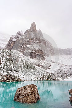 Sorapis lake in dolomiti mountains, italy. in winter photo