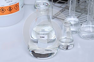 Sorbitol in container, chemical analysis in laboratory