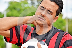 Sore Or Stressed Adult Male Soccer Player