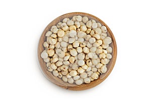 Sorghum seeds in wooden bowl isolated on white background. Top view. Flat lay.