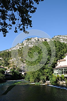 Sorgue river in Fontaine de Vaucluse in Provence, France photo