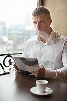 Sorious man on Coffee break in restorant