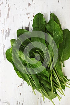 Sorrel on a wooden table, top view