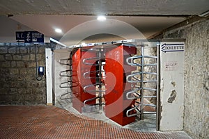 Sorrento railway station passenger pedestrian crossing underground tunnel turnstiles, italy
