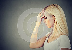 Sorrowful sad woman thoughtful with worried face expression