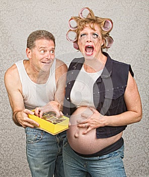 Sorry Man with Angry Expecting Woman