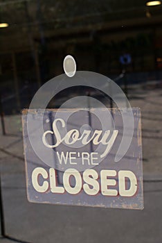 Sorry we're closed sign. closed sign