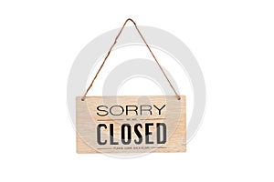 Sorry we\'re closed sign. wooden image hanging isolated on white background,With clipping path