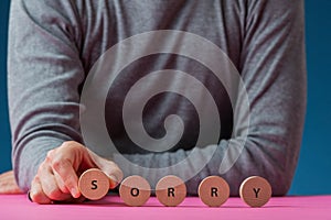 Sorry sign on wooden cut circles