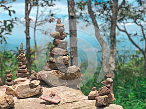 Sort of stone or stacked stone with nature background.