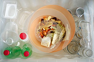 Sorting of garbage types. Waste management concept. Top view. Conceptual image for environmental pollution and consumerism.