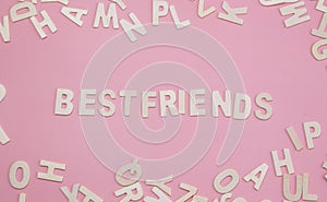 Sorting letters Bestfriends on pink.