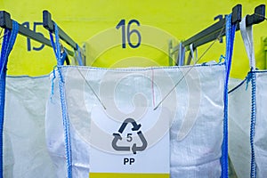 Sorting recyclables. The sorted polypropylene PP plastic, is placed in a container with the appropriate marking