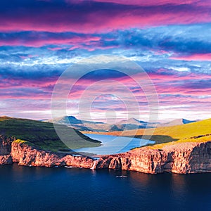 Sorvagsvatn lake on cliffs of Vagar island in sunset, Faroe Islands photo