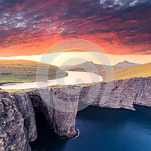 Sorvagsvatn lake on cliffs of Vagar island in sunset, Faroe Islands photo