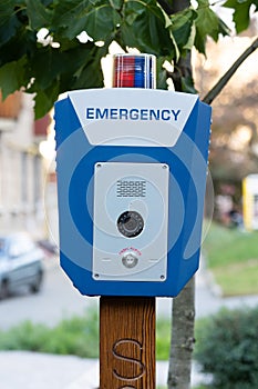 SOS, police, emergency button in the public park.