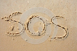 SOS in the sand photo