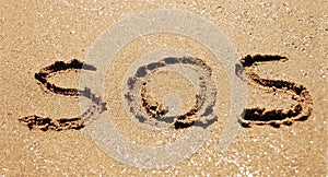 Sos in sand photo