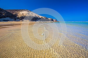 Sotavento sandy beach with vulcanic mountains in the background, Jandia, Fuerteventura, Canary Islands, Spain