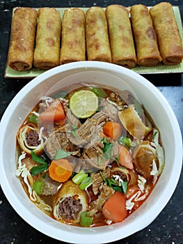Soto mie aka beef noodle with spring rolls
