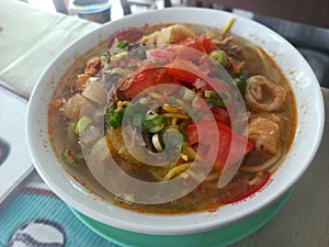 Soto Mie Bogor on the dining table at noon