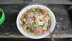 Soto or sroto Sokaraja is a traditional Indonesian soup mainly composed of broth, meat and vegetables, mixed with peanut sauce.