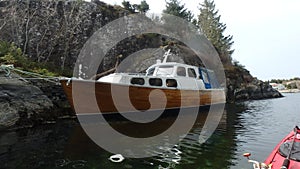 Sotra - Norway, parked boat and rocks